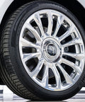 Close-up of a shiny car wheel showcasing the use of Rim EVO 30ml Ceramic Wheel Coating Kit For Rims High Heat Resistant Up To 1400F.
