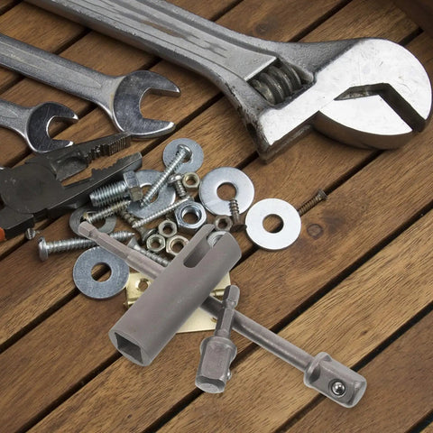 Must-Have Stainless Steel Trailer Jack Drill Adapter on a wooden surface with tools and hardware accessories.