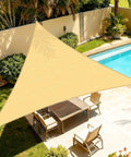 Sand Triangle Sun Shade Sail 10x13x16.4 Feet With Curved Edges installed over patio with pool, 185GSM HDPE material.