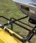 80 Pound ATV UTV Broadcast Spreader With 12 Volt Heavy Duty Motor mounted on a yellow ATV rack, ready for yard work