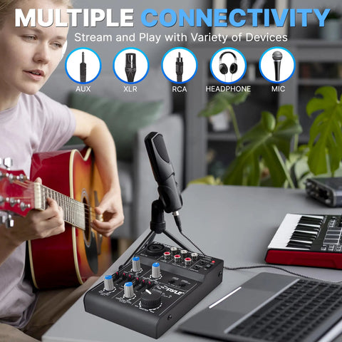 Musician using Five Channel Portable Audio Mixer With USB Interface And Rechargeable Battery Compact DJ Controller.