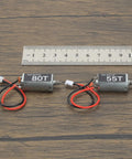 050 Brushed 55T And 80T Motors For One Twenty Fourth SCX24 with ruler for scale, 11T pinion gear visible, upgrade parts