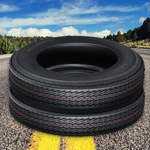 Stack of All Weather Radial Trailer Tire Set 4.80-12 6PR Load Range C Heavy Duty Deep Tread Tires on road