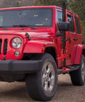 Rust-Resistant Hi-Lift Jack Handle Keeper Accessory Upgrade Bar Protector attached to red Jeep, keeping handle secure during transport.