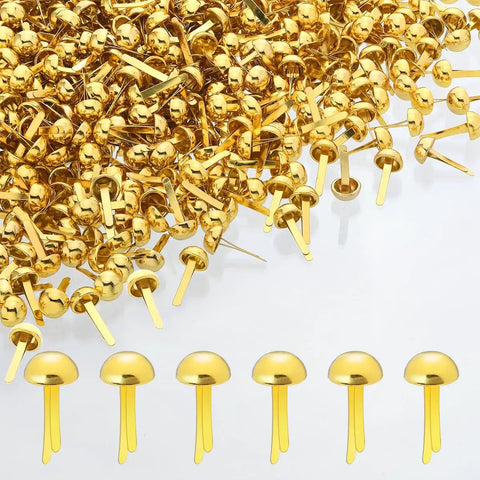 Top Tier Golden Brass Paper Fasteners For Scrapbooking And Handmade Craft Jobs 250 Piece Bulk Pack scattered on white background.