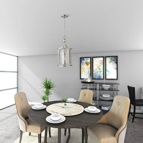 Delvelda One Light Pendant In Matte Nickel, 21-Inch Industrial Steel Cage Fixture In Modern Dining Room With Round Table