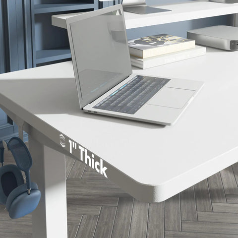 Adjustable Height Standing Desk With Raised Monitor Platform And Sleek Cable Tray For A Sick Home Office Setup. White 1" thick surface with laptop.