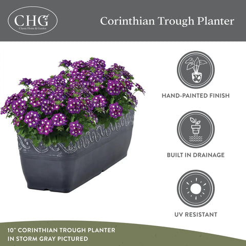 Rectangular Planter Box With Drain Plug For Indoor And Outdoor Use Perfect For Succulents And Cacti Lightweight Resin Trough Planter In Storm Gray Ten Inch Pack Of 1, shown with purple flowers, hand-painted finish, UV resistant.
