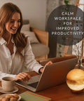Person working on laptop next to a Dual Illumination Himalayan Salt Lamp Round Globe In Pink White Gray With Dimmable Adjustable Glow Cozy Ambient Night Light Real Himalayan Crystal Salt Authentic From Khewra Mine For A Chill Vibe on a table, creating a tranquil ambiance.