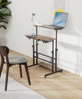 Mobile Standing Desk With Adjustable Height Rolling Desk Stand Up Station For Home Office Portable Laptop Desk On Wheels With Charging Station Rustic Brown in home office setup.