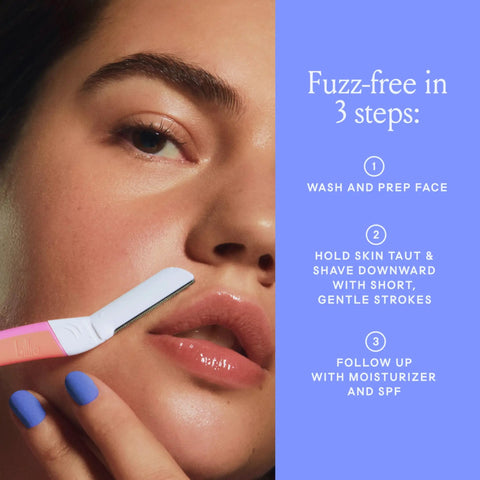 Woman using Dermaplane Starter Kit with reusable handle and refill blades for peach fuzz removal and brow shaping, close-up.