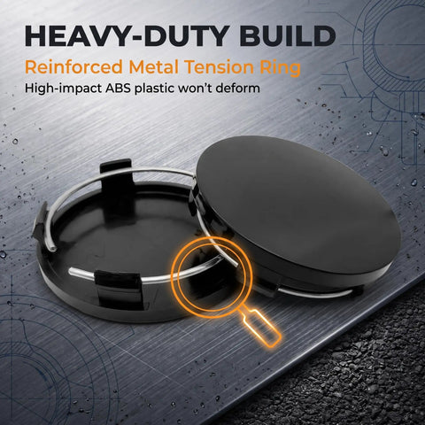 Premium 4 Pack Wheel Center Caps Universal Fit For Cars Trucks 2.36 Inch Snap In Rim Hub Covers Tough Abs Plastic Black showing heavy-duty build and metal tension ring.