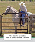 A cowboy on a white horse using Lock Down Your Yard With These 2Way Lockable Gate Latches 10Pack for simple entry.