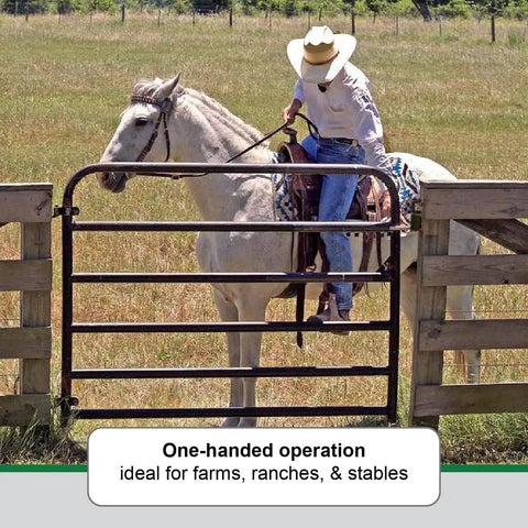 A cowboy on a white horse using Lock Down Your Yard With These 2Way Lockable Gate Latches 10Pack for simple entry.