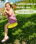 Child playing on a Tree Swing Disc Seat for Kids Yellow Round Outdoor Backyard Swing With 220lbs Capacity Perfect for Ages 3 To 10 Adjustable Rope 55 To 71 Inches Durable Poly Rope and Weather Ready Frame All Day Outdoor Fun, holding up to 120lb.