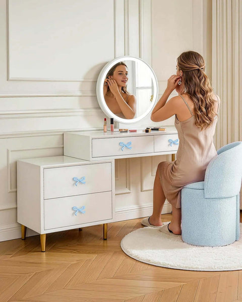 Blue Bow Dresser Knobs 4 Pack Small Decorative Cabinet Drawer Pull Handles For Girls Bedroom And Nursery Decor displayed on white vanity
