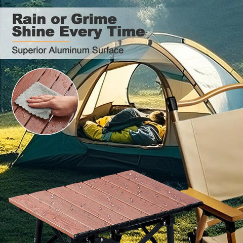 Portable Camping Table With Adjustable Height From 15.8 To 22 Inches Folding Outdoor Table in front of a tent, surface shown wet.
