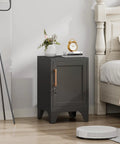 Beefy Steel Nightstand With A Tight Locking Door And Adjustable Shelf Slick Black Metal Bedside Cabinet For Bedroom Home Office Keeping Your Stuff Secure in a modern bedroom setting.