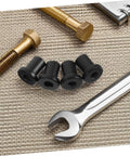 Beefy Carbon Steel Sliding Barn Door Clamps 4 Pack showing heavy duty track hardware with wrench and bolts for barn doors.