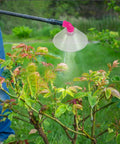 Pro Grade 30 Pack High Pressure Misting Nozzles With Sprayer Guard For Backpack Sprayer in use on garden plants