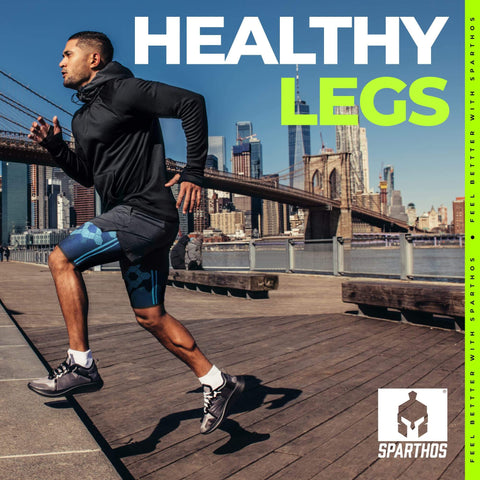 Athlete wearing Cobalt Blue Thigh Compression Sleeve Size Small For Pain Relief Fast Recovery and Performance running by bridge.