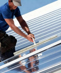 Worker using 15.25 Inch Sheet Metal Bender Hand Tool With 1 Inch Fold Depth Manual Hemming Tool on metal roofing