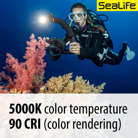 Diver using Underwater Photo And Video Light Beast 2500 Lumen COB LED With 120 Degree Wide Beam for vibrant coral photography.