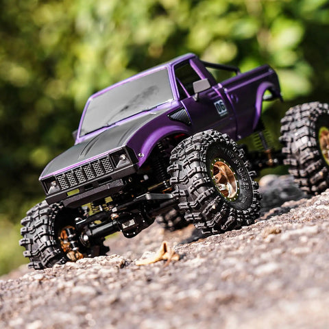 1/18 Scale RC Crawler Pickup Hard Body Shell With Bed Rack Purple For TRX4M Defender Bronco on rocky terrain