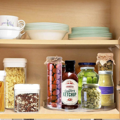 Two Pack Clear Lazy Susan Turntable Organizer For Kitchen Cabinets And Countertops, 10.6 Inch Turntable with pantry items.