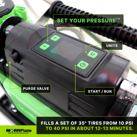 Close-up of FiveSix PSI Pro Auto Shutoff 12V Off Road Air Compressor control panel with buttons and display screen for tire inflation.