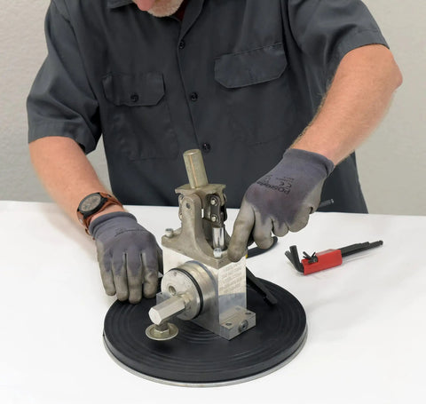 Heavy Duty Manual Turntable Platform Built Tough With 500 Lb Capacity And Rubber Top, worker using steel platform in workspace