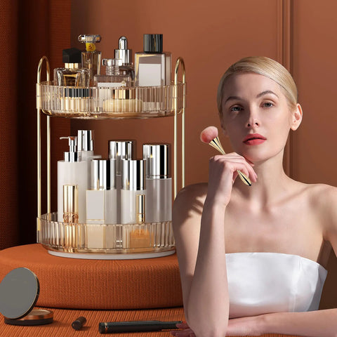 Kick Back And Organize Your Vanity Game With This Smooth Spin 360 Rotating Makeup Organizer Featuring Two Tier High Capacity Storage For Cosmetics Skincare And Perfume In Classic Amber Gold with beauty products displayed.