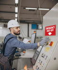 Badass Emergency Shut Off Sign Sticker With Knockout Down Arrow Hella Waterproof Self Adhesive Heavy Duty Safety Marker For Power Tools And Factory Equipment on control panel at a factory.