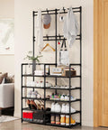 Five Tier Coat and Shoe Rack with Eight Hooks Double Row Organizer for Entryway and Living Spaces Keeps Shoes Hats Bags Neatly Organized in Black for Entryways Closets and Mudrooms Space Saver All In One against a wall