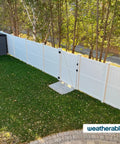 Heavy Duty Double Gate Hardware Kit For Outdoor Vinyl Fences featuring a white double gate on a green lawn.
