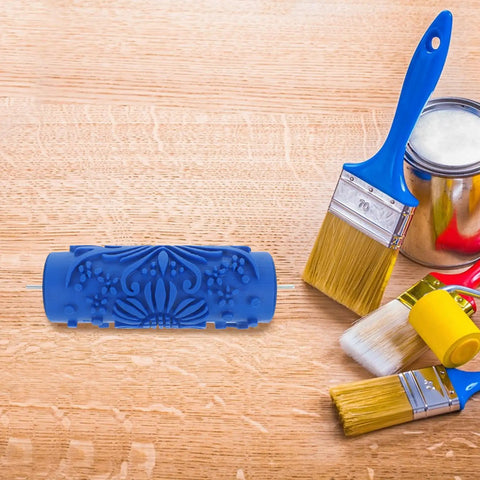 Artistic Floral Texture Paint Roller For DIY Home Wall Projects Plus Rubber Design Tool, blue rubber roller on wooden surface.