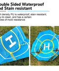 On The Go Foldable Night Vision Drone Landing Pad 20 Inch Double Sided Waterproof Helipad in blue on grass showing water resistance