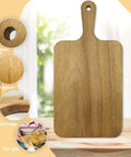 Acacia wood cutting board with handle, front view, natural wood grain, 13.8 x 7 in