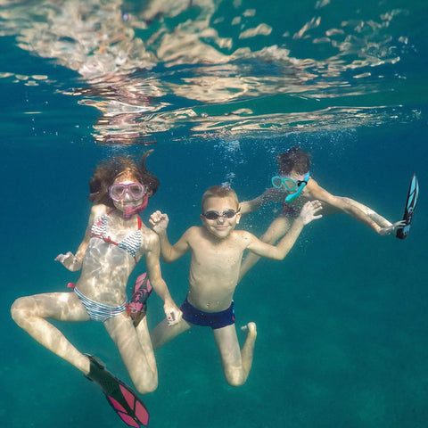 Children underwater using Kid Friendly Snorkel Set With Dry Top Snorkel, Adjustable Fins, Goggles, Mask And Bag For Ages 5 To 14
