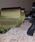 Rifle Buttstock Cheek Rest With 7 Shell Ammo Pouch Tactical Hunting Accessory on carpeted floor