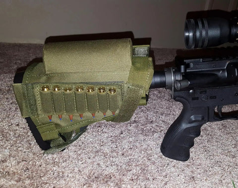 Rifle Buttstock Cheek Rest With 7 Shell Ammo Pouch Tactical Hunting Accessory on carpeted floor