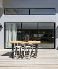 Outdoor patio with 2-Pack Outdoor Wall Sconce in Weatherproof Black Finish, Dope Vintage Inspired Modern Industrial Lighting.
