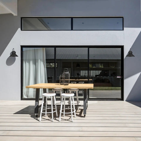 Outdoor patio with 2-Pack Outdoor Wall Sconce in Weatherproof Black Finish, Dope Vintage Inspired Modern Industrial Lighting.