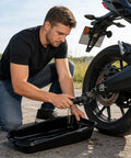 Heavy Duty Oil Drain Pan With Giant Capacity And Leak Proof Design For Super Smooth Auto Repairs And Parts Cleaning. Mechanic using the pan.