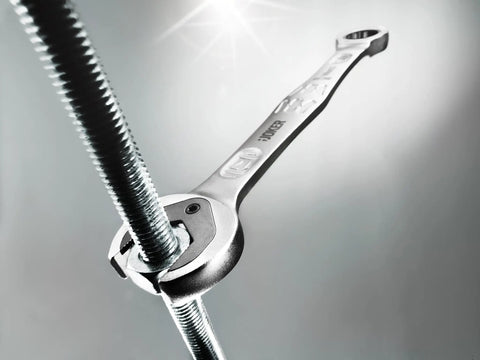 Joker SB Ratcheting Combination Wrench Nine Sixteenths Inch Open End Hold With Depth Stop High Torque Transmission in action on pipe