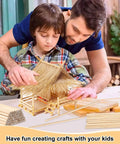 Father and son using Top Shelf Unfinished Round Wooden Dowel Rods 1/4 X 18 Inch Birch for DIY craft project.