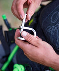 Hands using V3 Quickie Steel Shackle For Basal Canopy Anchors Or Redirects With Quadruple Action Rotating Slic Pin in outdoor setting
