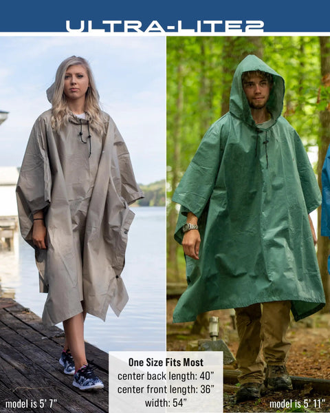 Models wearing Ultra Lite 2 Reusable Waterproof Breathable Poncho For Rain Gear That Actually Works in tan and green next to water and forest.