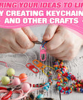 Hands using pliers to create keychains with vibrant Premium Metal Lobster Clasps With Smooth Rollin Rings For Custom Keychains And Craft Supplies.