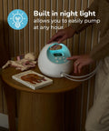Hassle Free Portable Electric Breast Pump With Rechargeable Battery And Soft Suction Levels Includes Total Must Have Travel Tote Nursing Bottles And Insulated Cooler Bag For Busy Mom Life on a wooden table with night light feature.